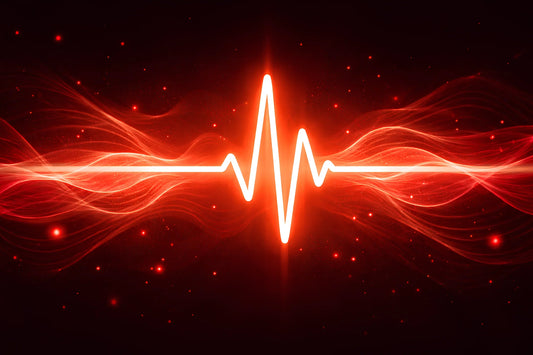 Glowing red pulse waveform with flowing light waves on a dark background representing pulsing red light