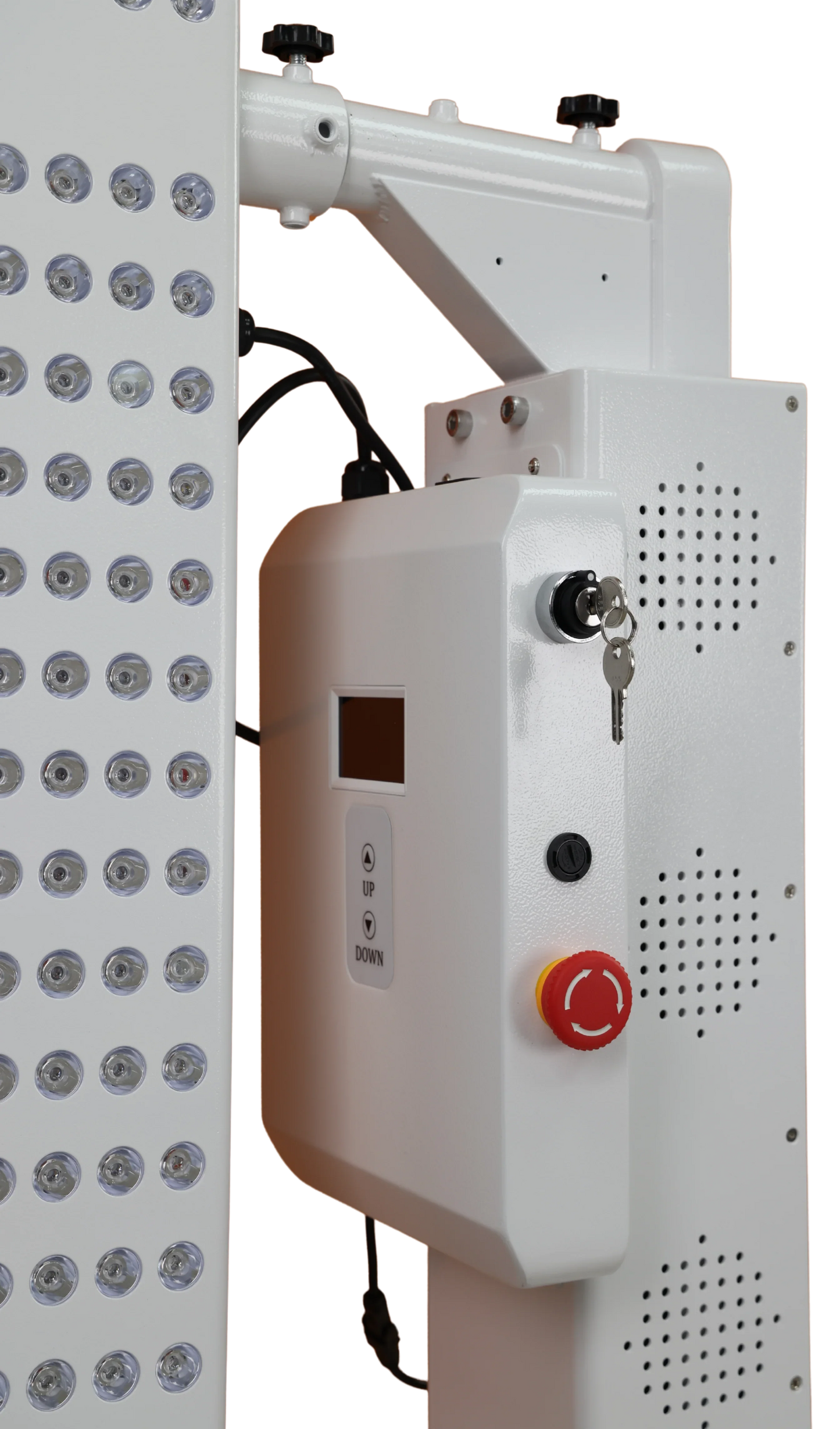 Control panel with buttons and a red start/stop button next to a light fixture.