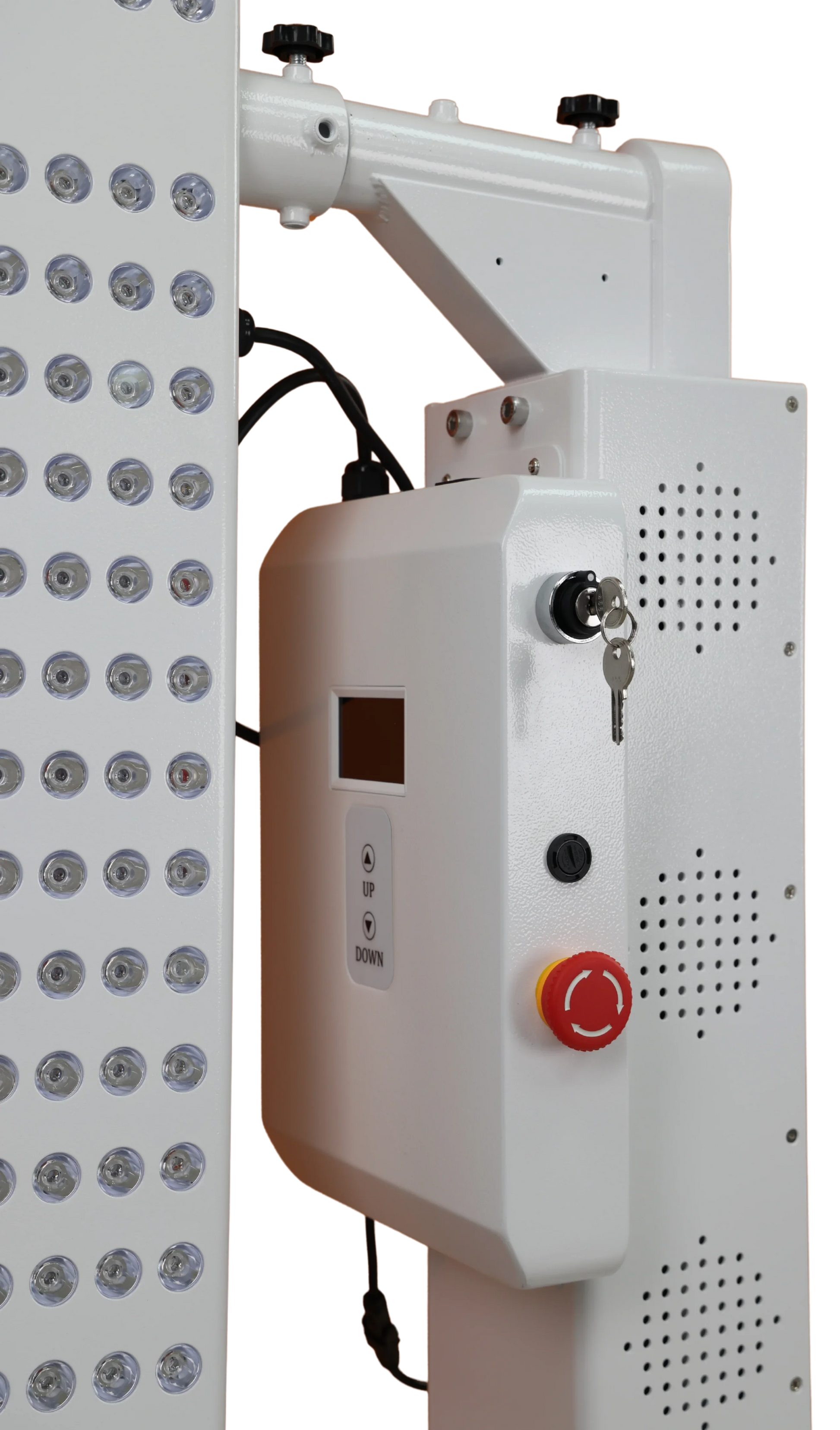 Control panel with buttons and a red start/stop button next to a light fixture.