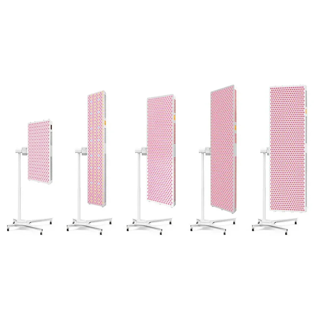 Five adjustable red light therapy panels on white electric stands with 360-degree rotation